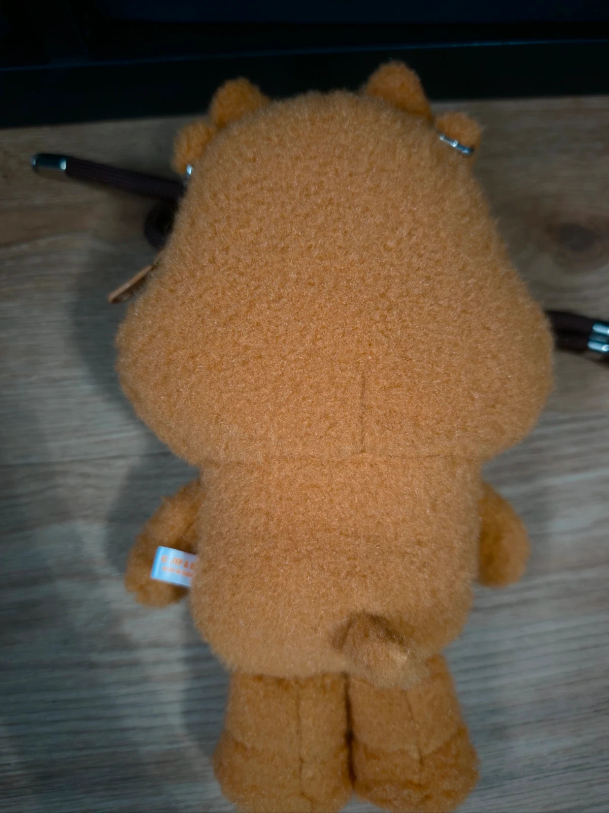 Stray Kids Run It Merch Cross Body Bag Han Quokka SKZOO, back of the character bag