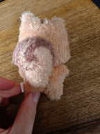ATEEZ Jjongrami Fluffy Plush Keyring Hongjoong, back of the plush showing striped tail
