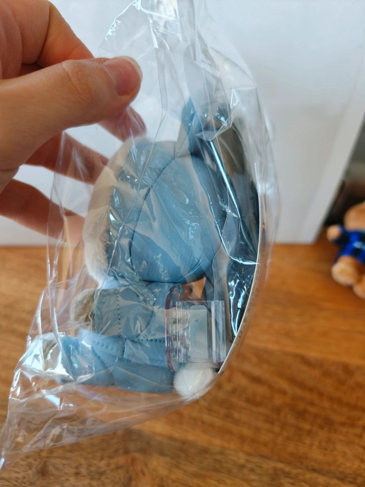 Stray Kids SKZOO Wolf Chan Phone Holder (dominATE JAPAN), angled view of the packaged phone holder