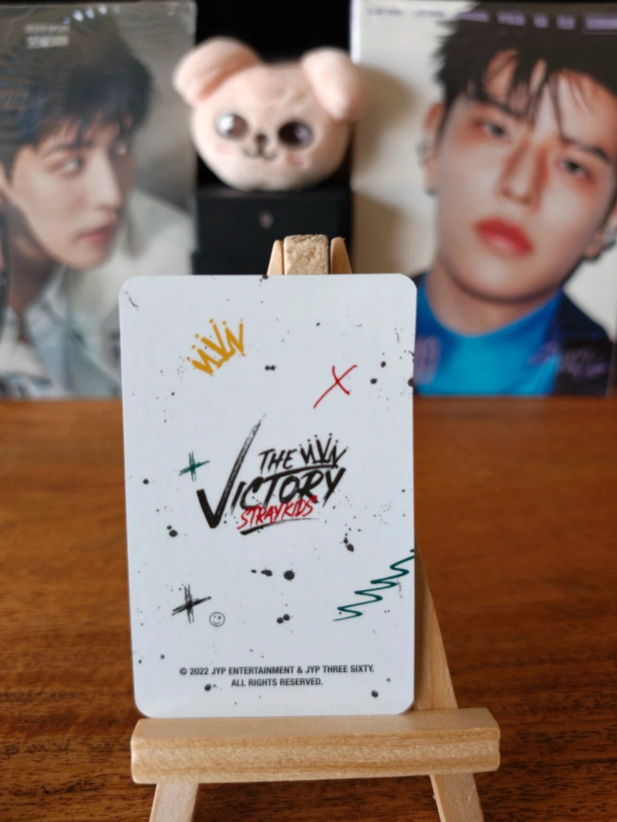 Stray Kids Seungmin THE VICTORY Photocard (White Shirt - Seated Portrait) — THE VICTORY reverse design