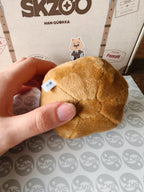 Stray Kids SKZOO HAN QUOKKA Face Bag Charm (5-STAR Dome Tour 2023), underside of the face charm showing seams and label