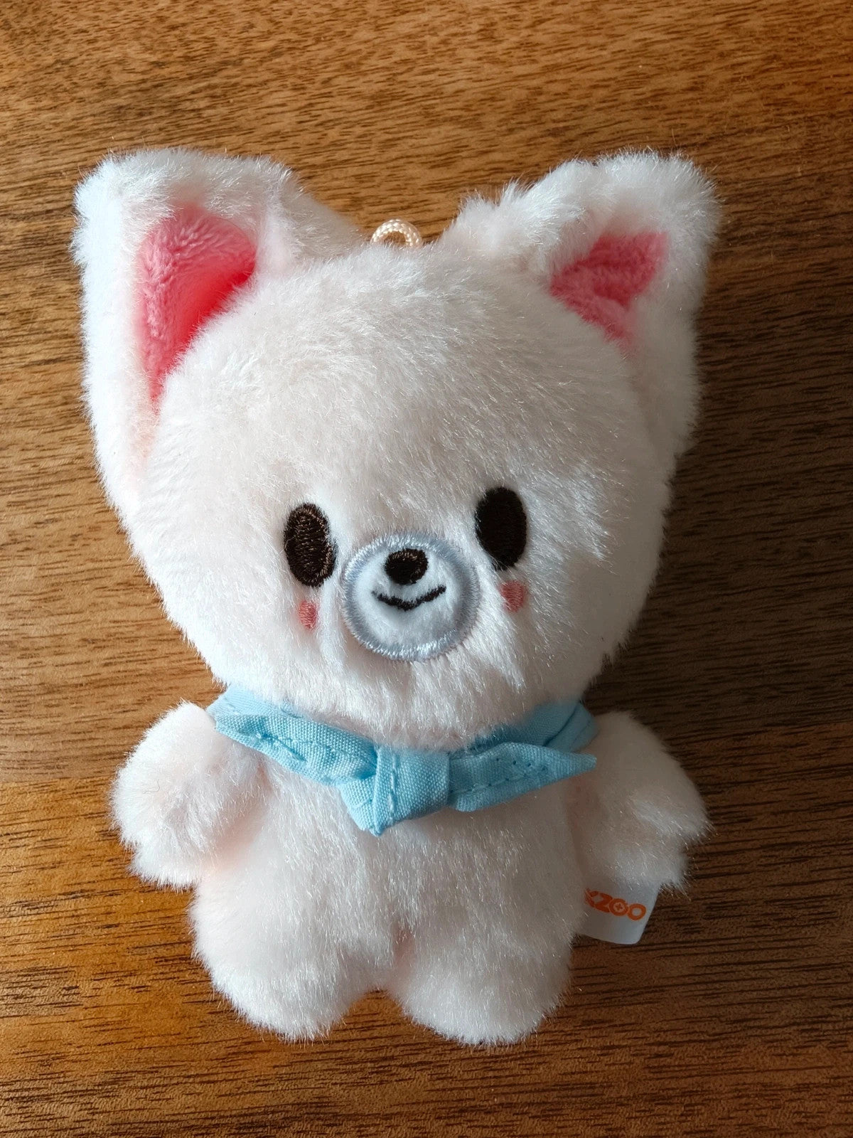 Stray Kids SKZOO FoxI.Ny Plush (PILOT), front of the white fox plush with a blue scarf