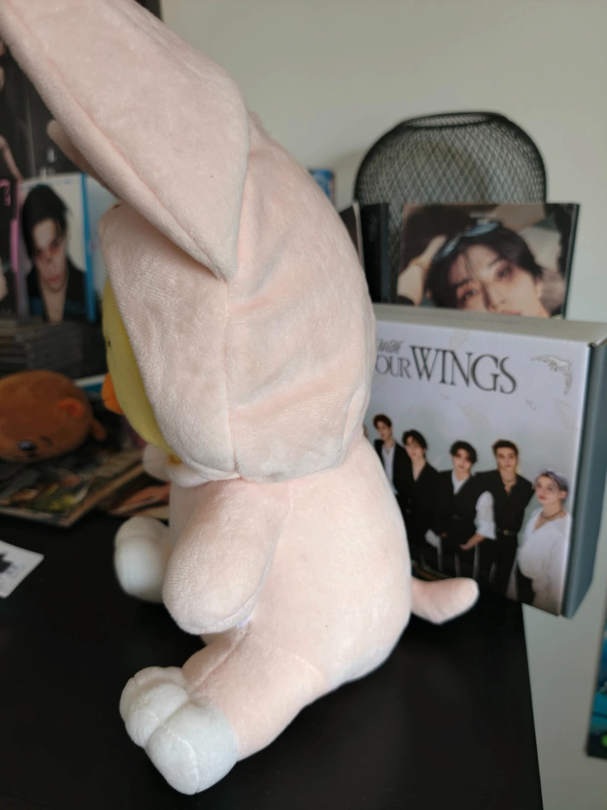 Stray Kids SKZOO BbokAri Plush (TOY WORLD, FoxI.Ny Suit), side view showing the hood and tail