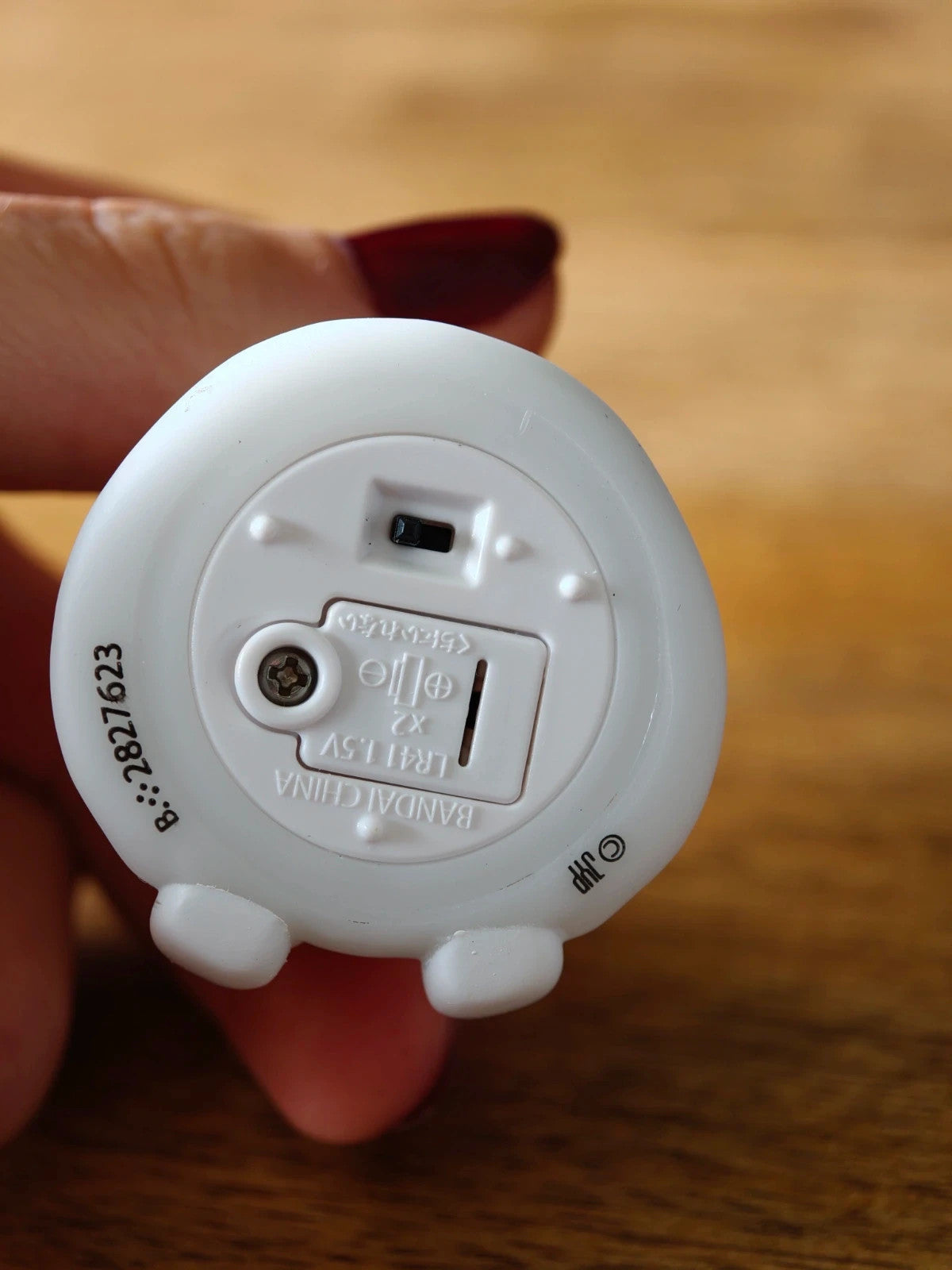 Stray Kids SKZOO Leebit Gacha Light, underside showing switch and battery compartment
