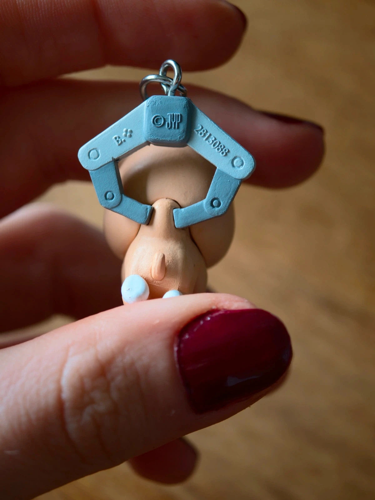 Stray Kids SKZOO DWAEKKI Gacha Keyring (TOY WORLD), back of the small figure with blue headpiece