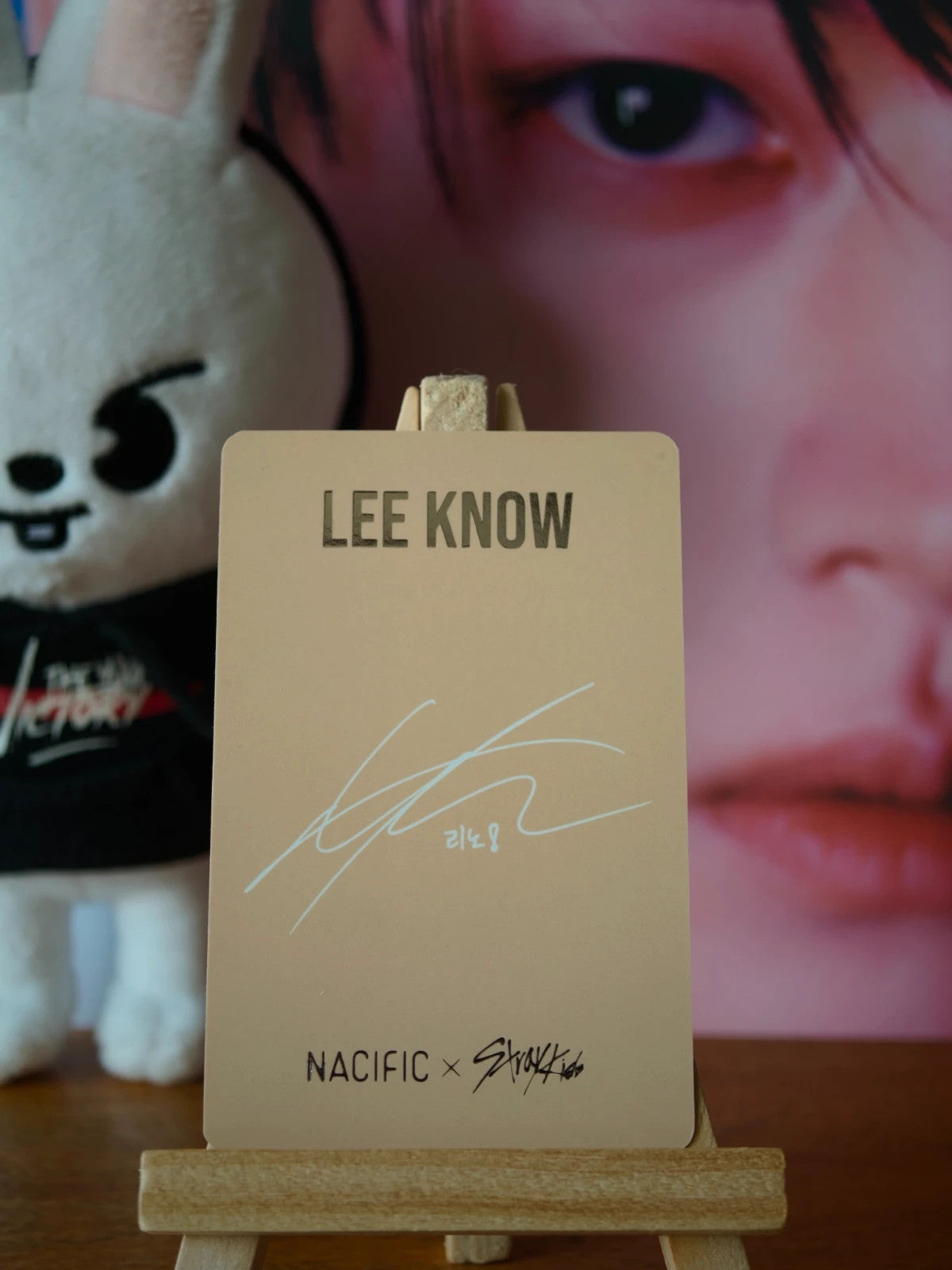 Stray Kids Lee Know NACIFIC Photocard (Round 9 This Moment) — reverse with printed signature design