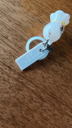 Stray Kids SKZOO Jiniret Figure Keyring, back of the white figure keyring and strap