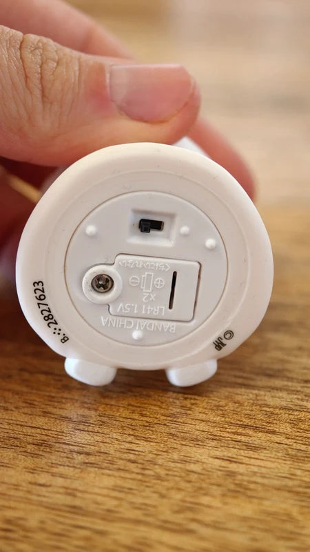Stray Kids SKZOO Jiniret Gacha Light, underside showing switch and battery compartment