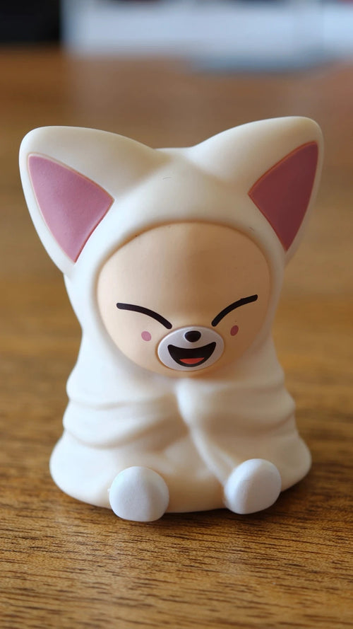 Stray Kids SKZOO FoxI.Ny Gacha Light, front of the fox figure in a white hood