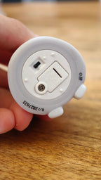 Stray Kids SKZOO Wolf Chan Gacha Light, underside showing switch and battery compartment