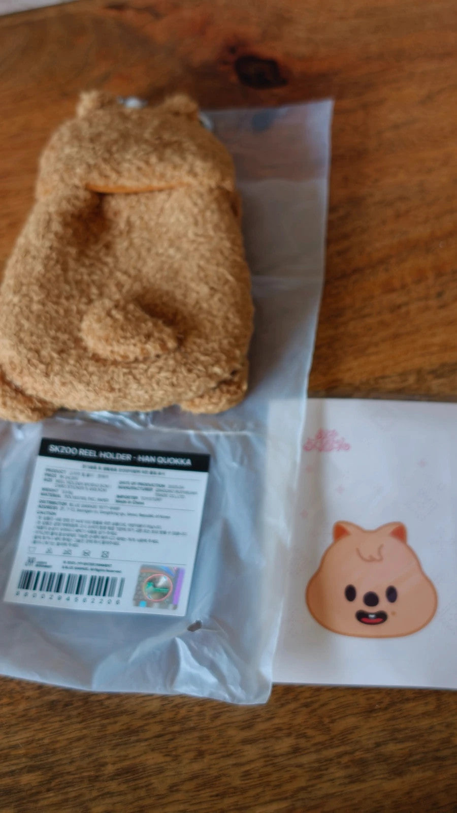 Stray Kids SKZOO HAN QUOKKA Reel Holder, back of the packaged reel holder