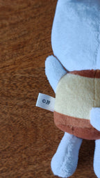 Stray Kids SKZOO Jiniret Plush Keyring, close-up of the outfit and fabric label