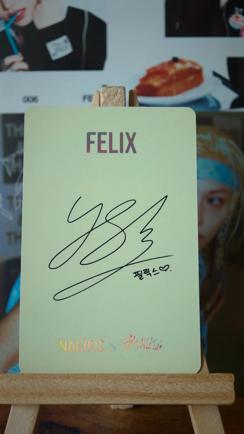 Stray Kids Felix NACIFIC Photocard (Round 2 Holographic) — reverse with printed signature design