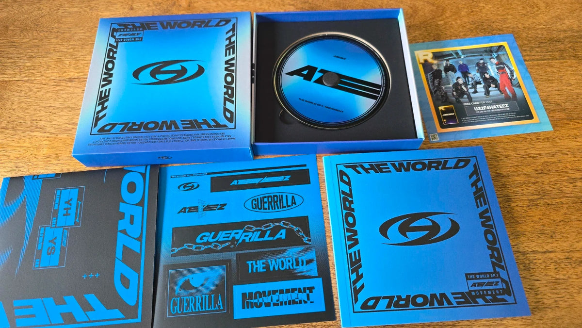ATEEZ The World Ep 1 Movement Album, blue album packaging, disc and printed inserts