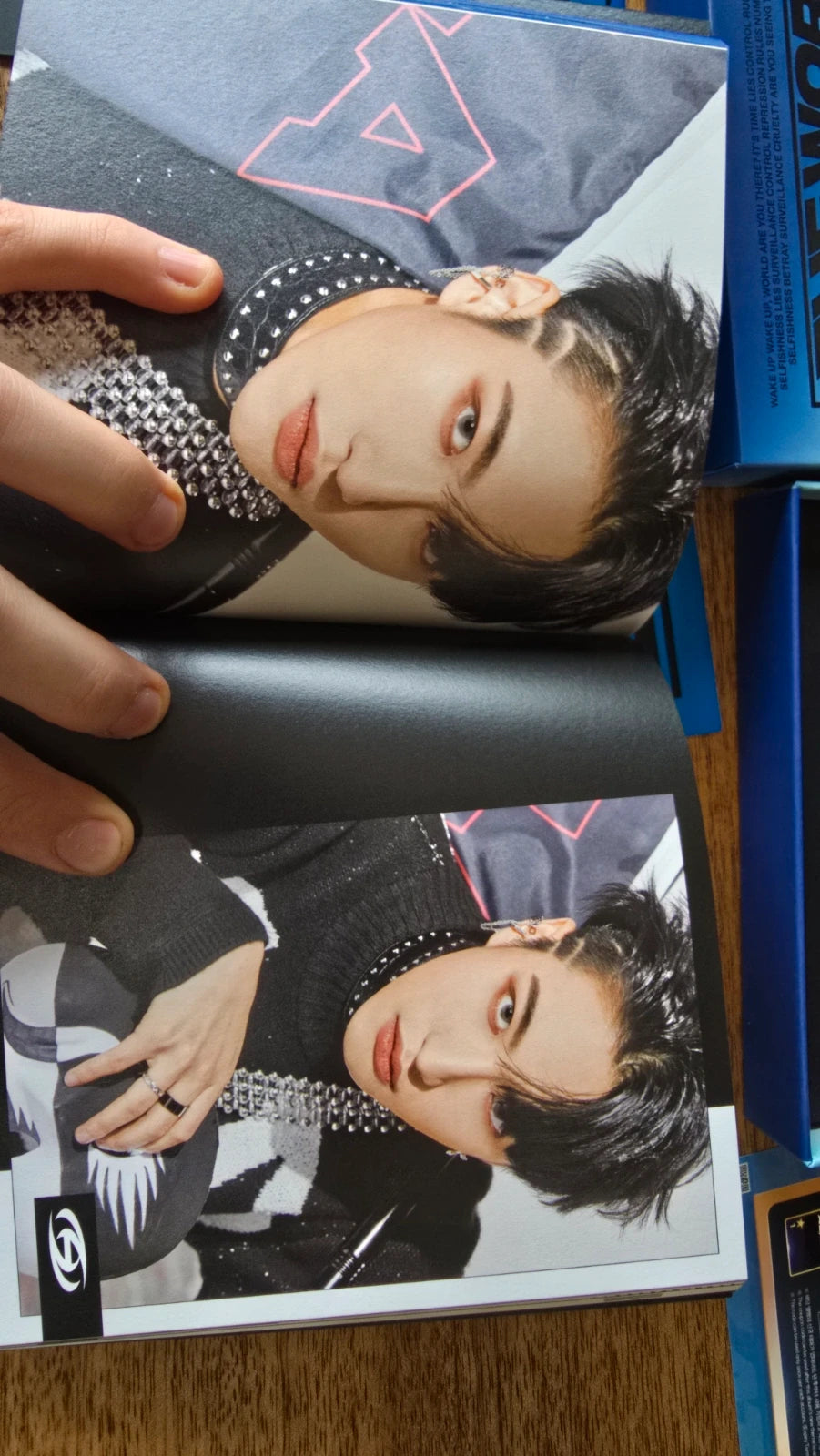 ATEEZ The World Ep 1 Movement Album, open photobook showing two member portraits