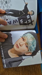 ATEEZ The World Ep 1 Movement Album, open photobook showing two member portraits