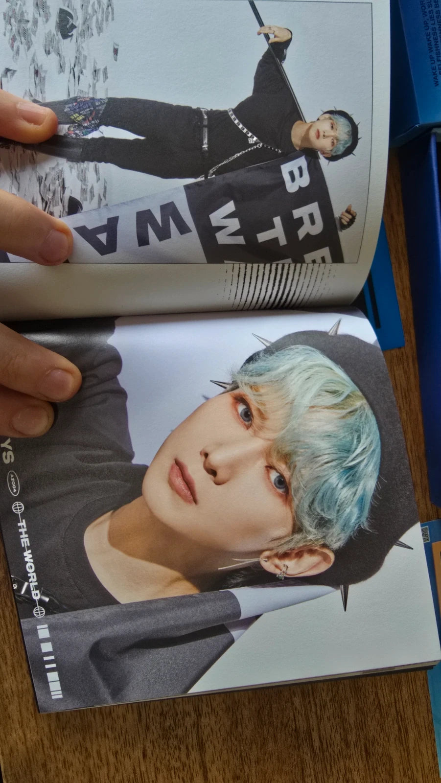 ATEEZ The World Ep 1 Movement Album, open photobook showing two member portraits