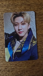 Stray Kids ODDINARY Photocard Changbin Jewel Case, portrait in a blue-and-yellow jacket