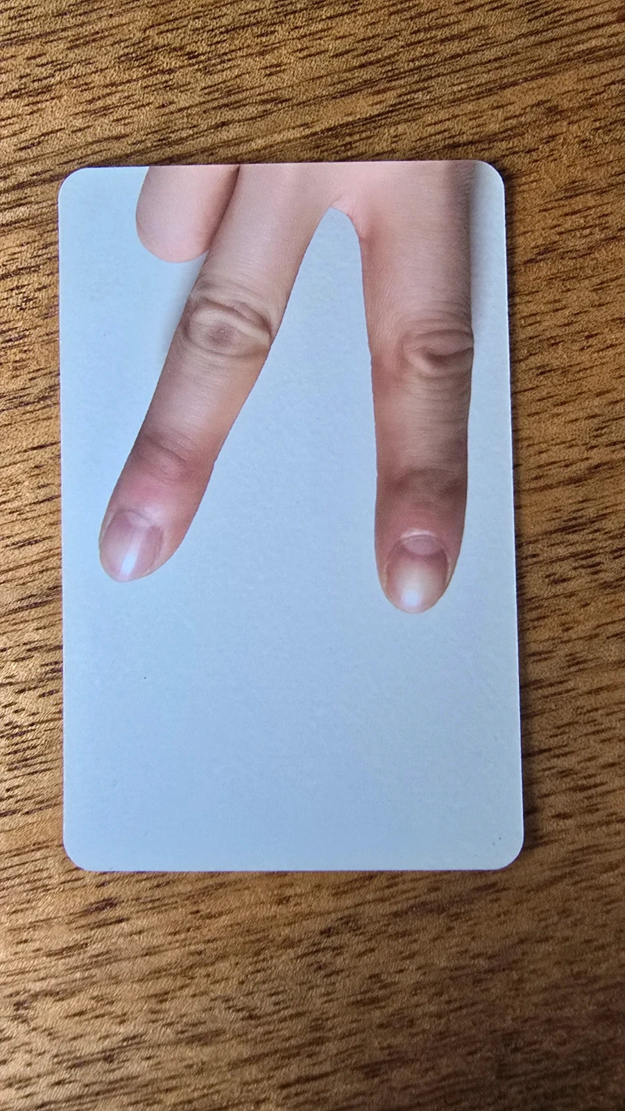 Stray Kids 5-STAR Photocard Changbin, second side showing a close-up V-sign hand gesture