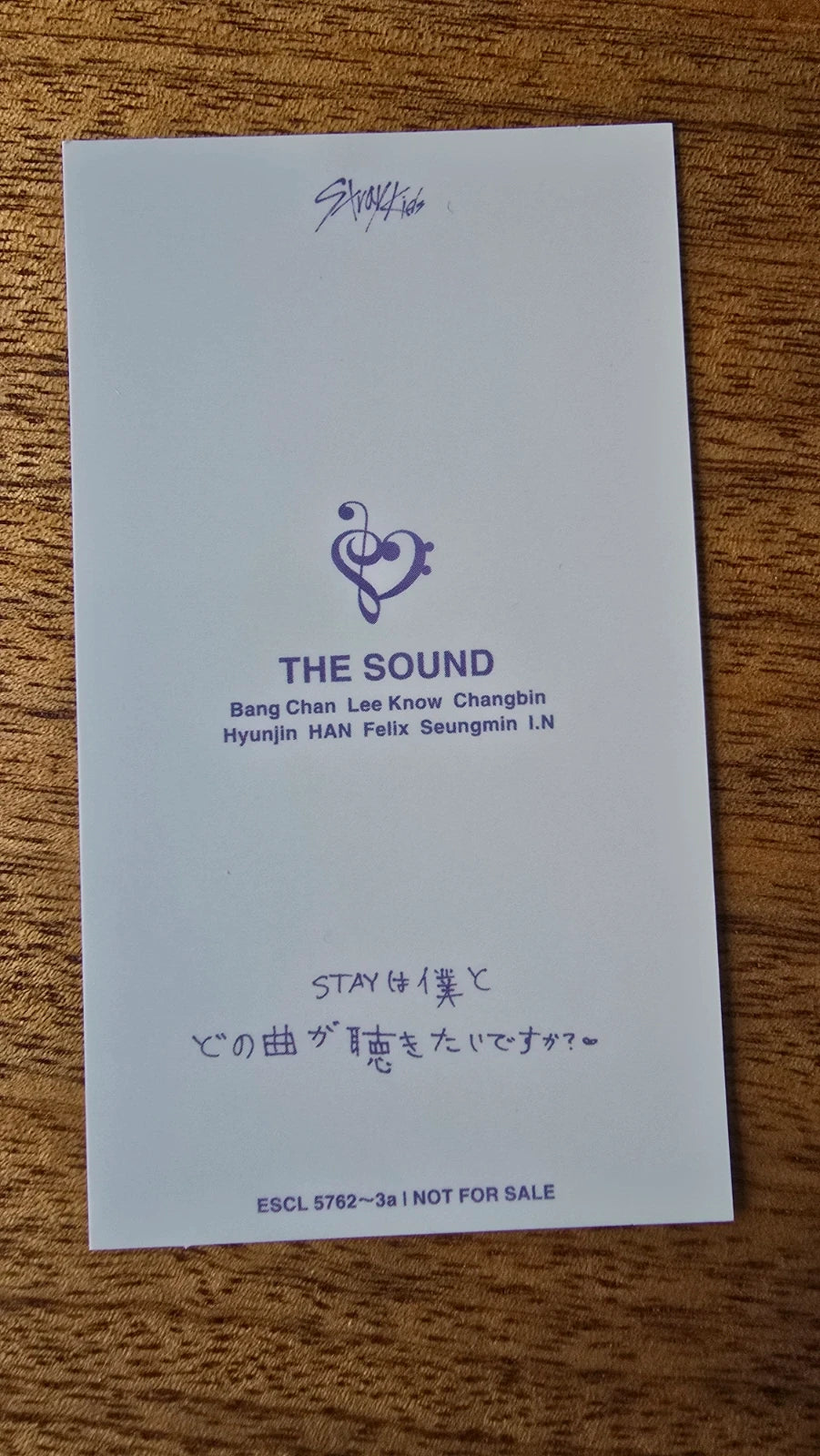 Stray Kids The Sound Photocard Felix, white reverse with THE SOUND logo and message