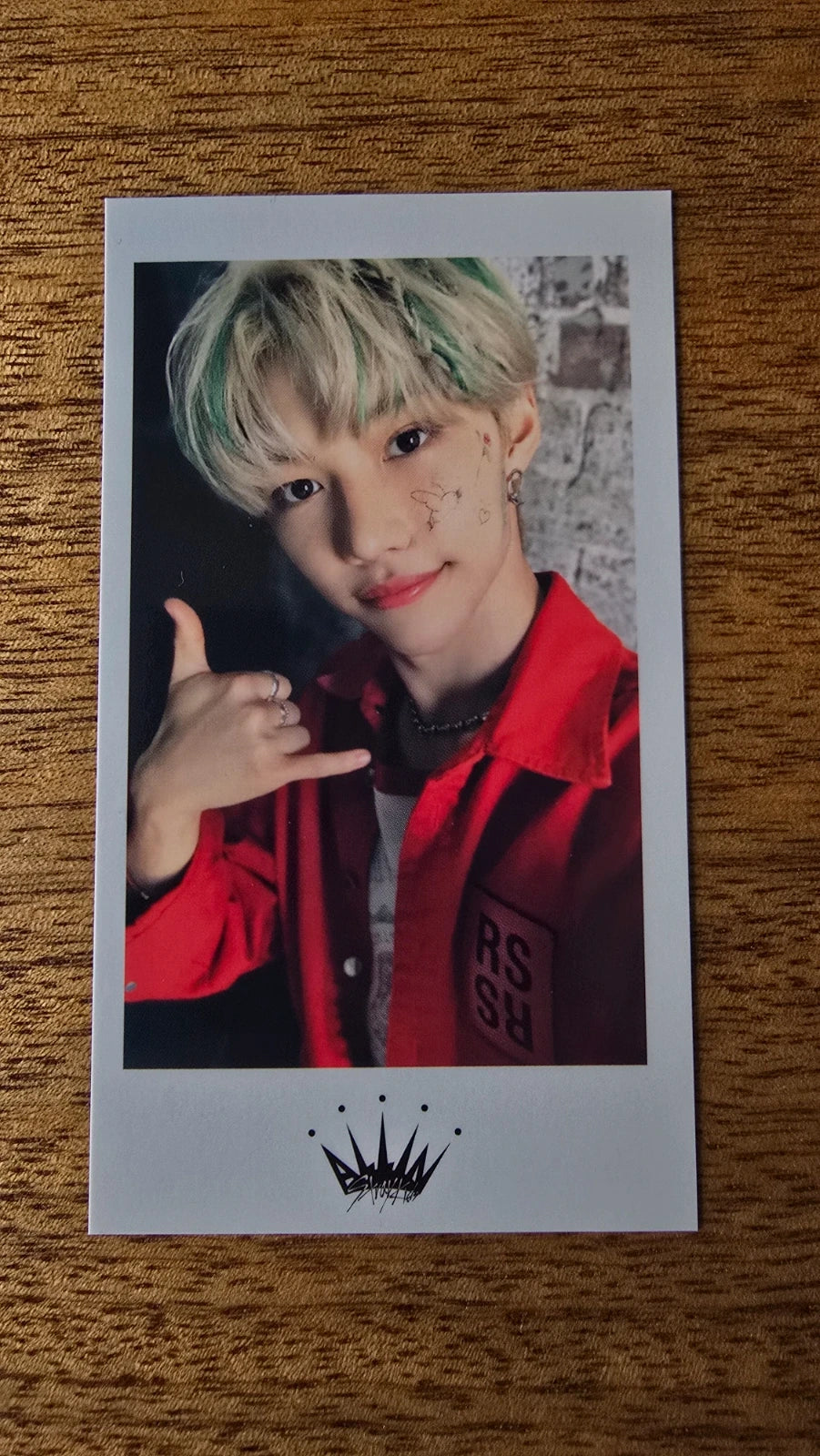 Stray Kids All In Photocard Felix, portrait in a red outfit with white border