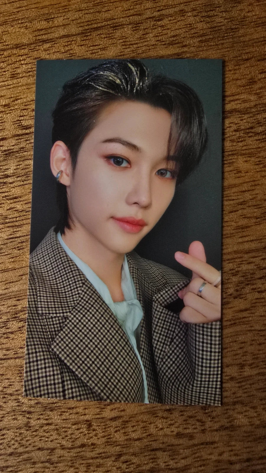 Stray Kids The Sound Photocard Felix, portrait in a checked jacket with finger-heart pose