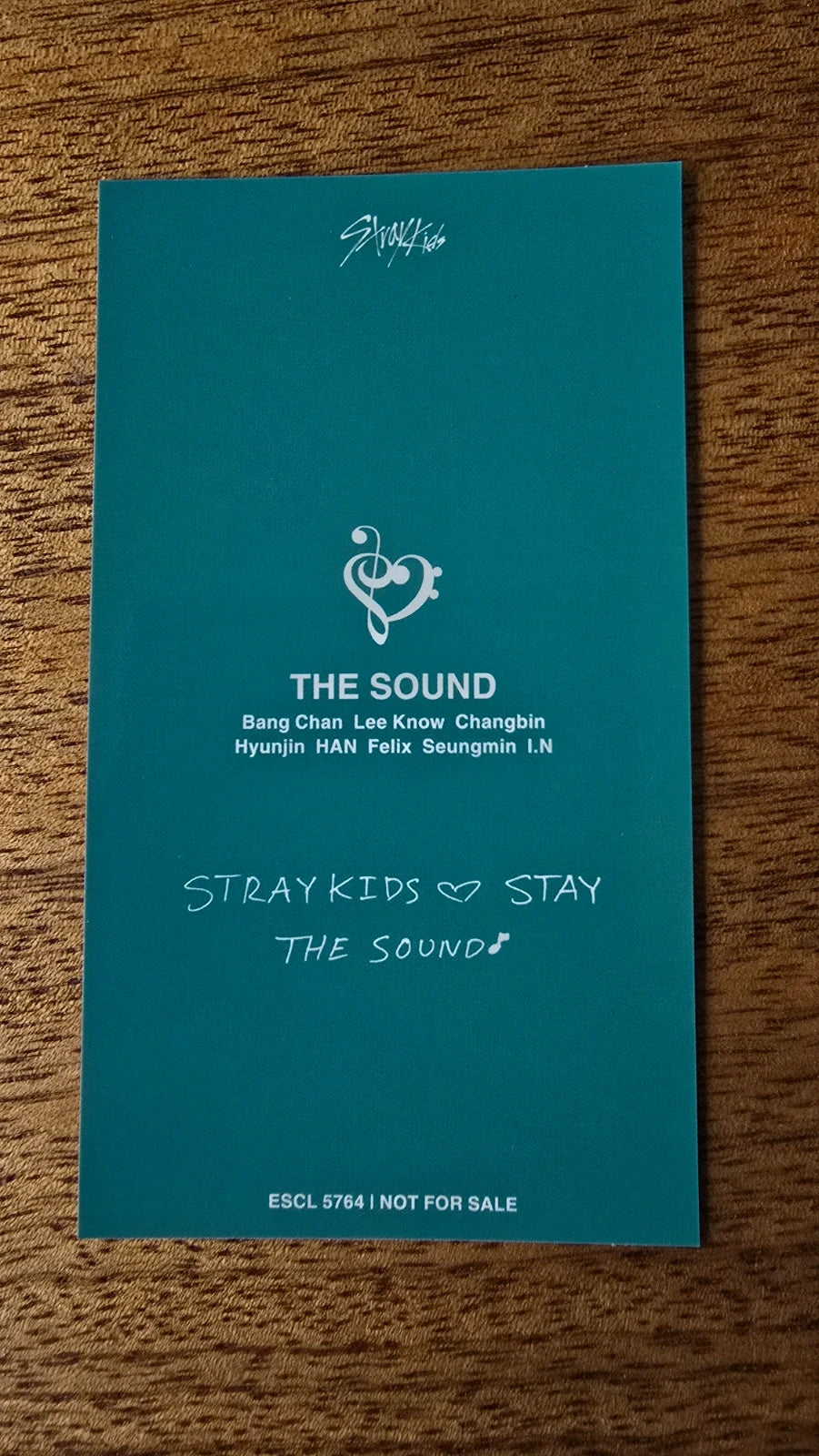 Stray Kids The Sound Photocard Felix, turquoise reverse with THE SOUND logo and message