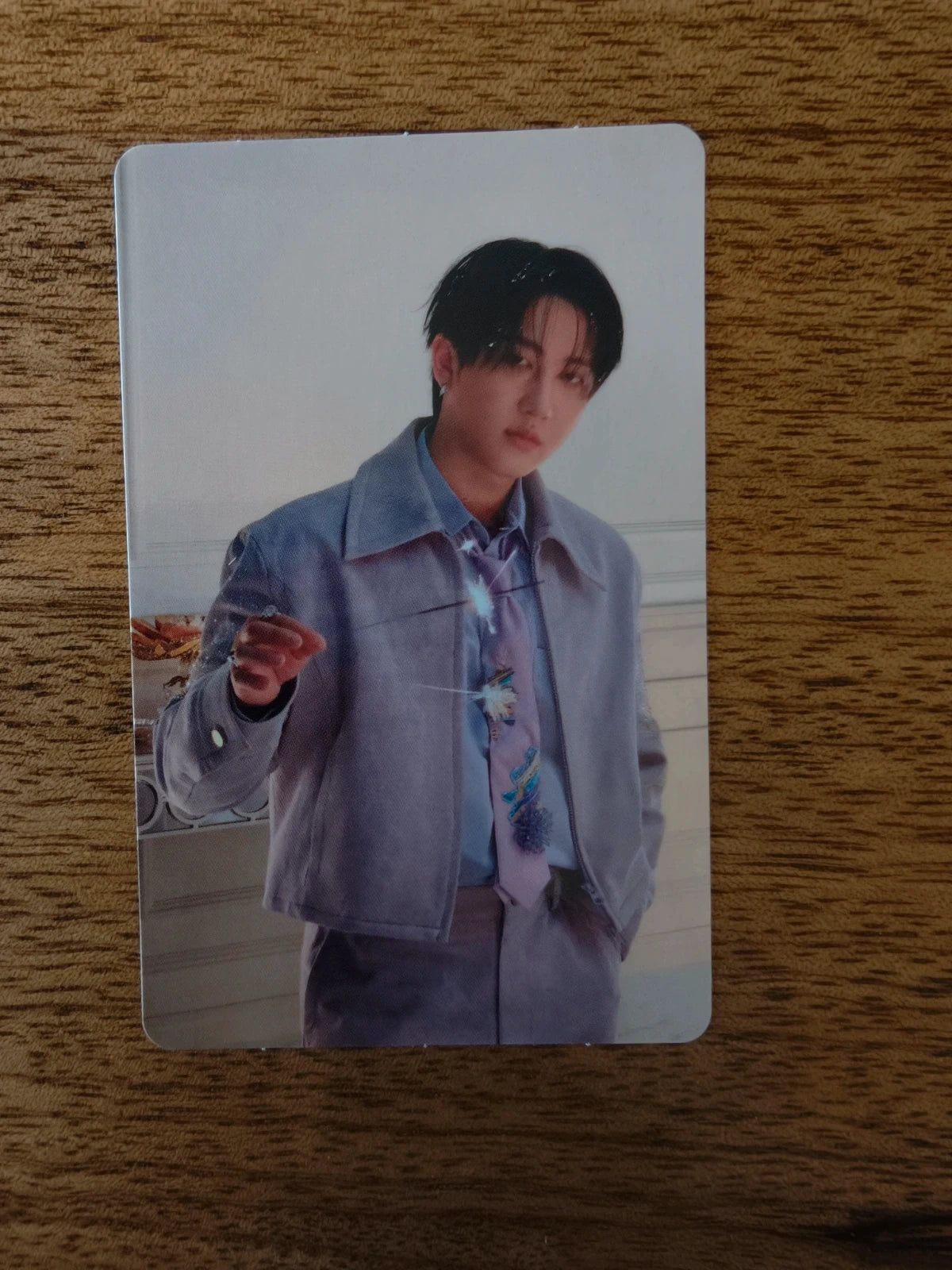 Stray Kids Changbin Photocard Hollow, portrait in a pale jacket holding a small prop