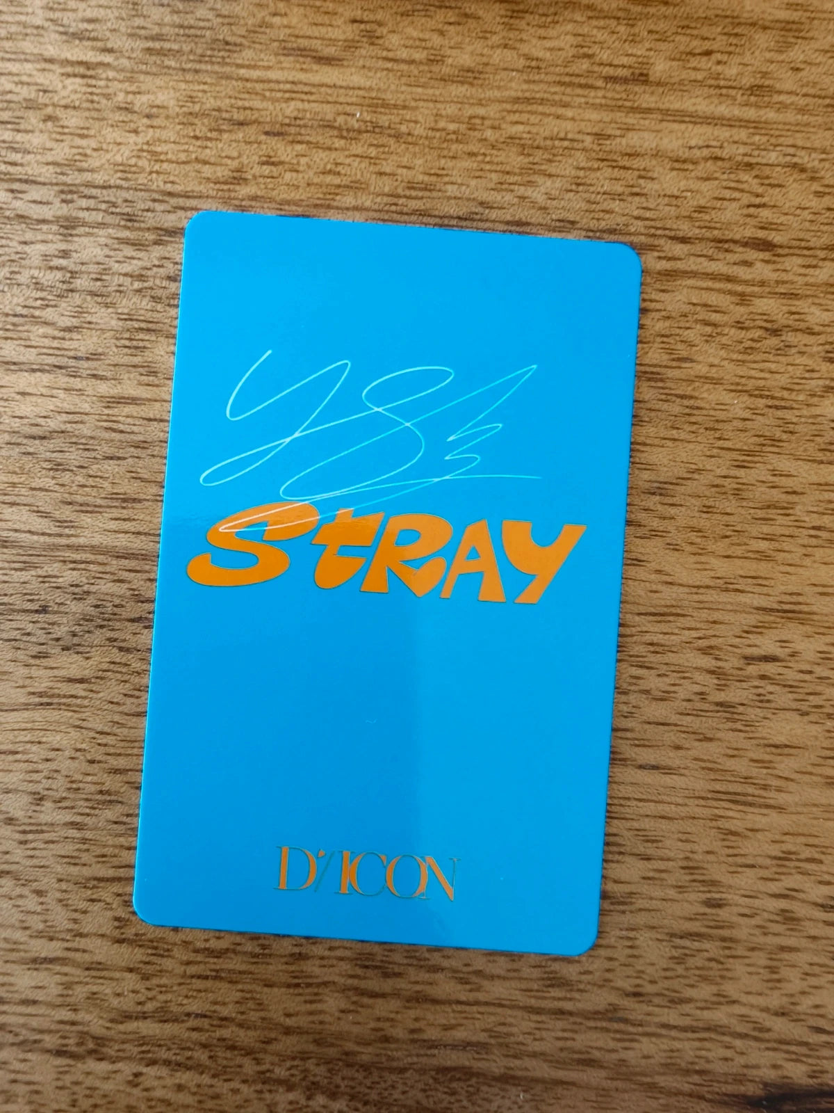 Stray Kids Felix Photocard DICON, blue reverse with orange STRAY lettering