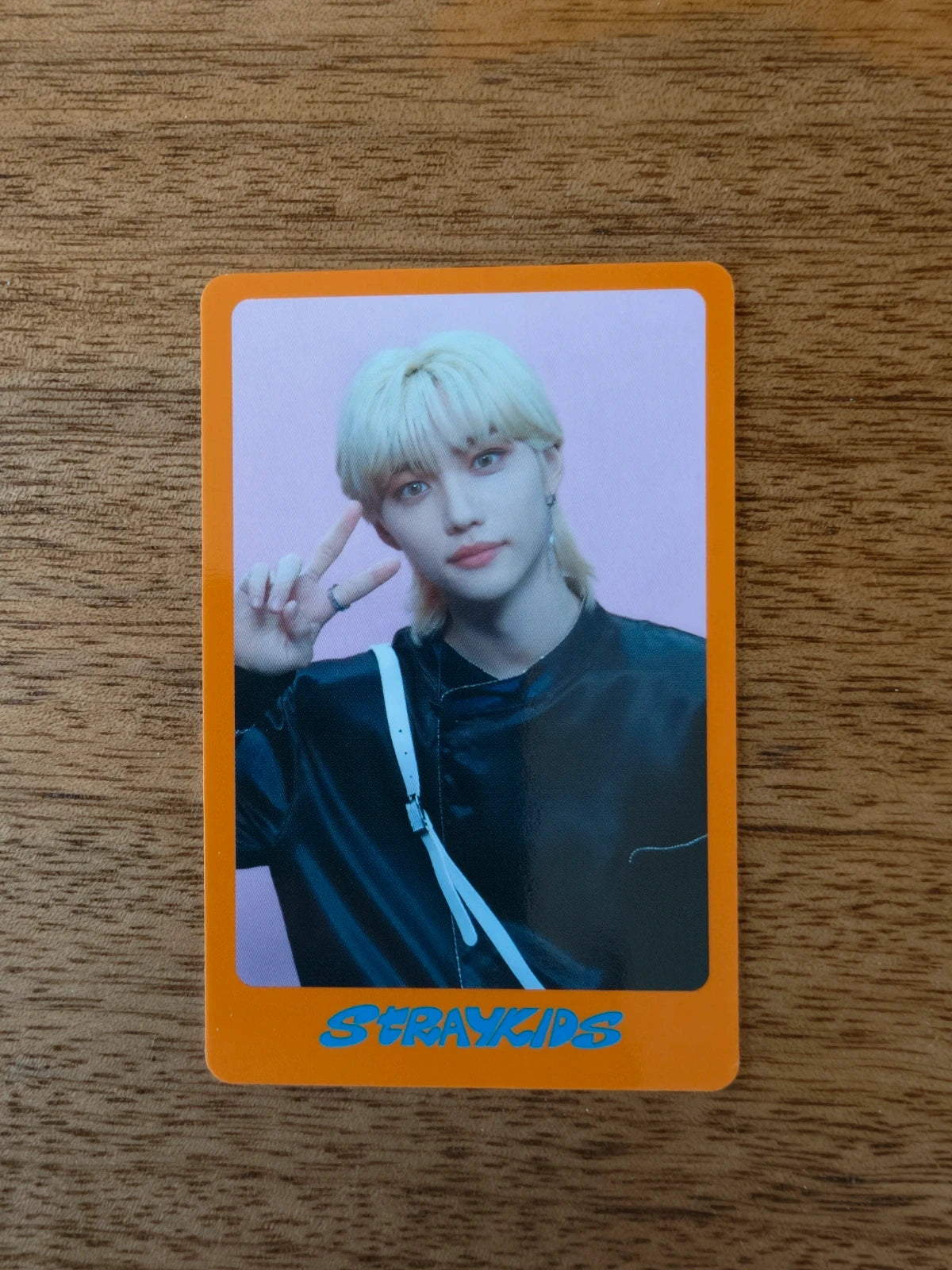 Stray Kids Felix Photocard DICON, blond portrait inside an orange border