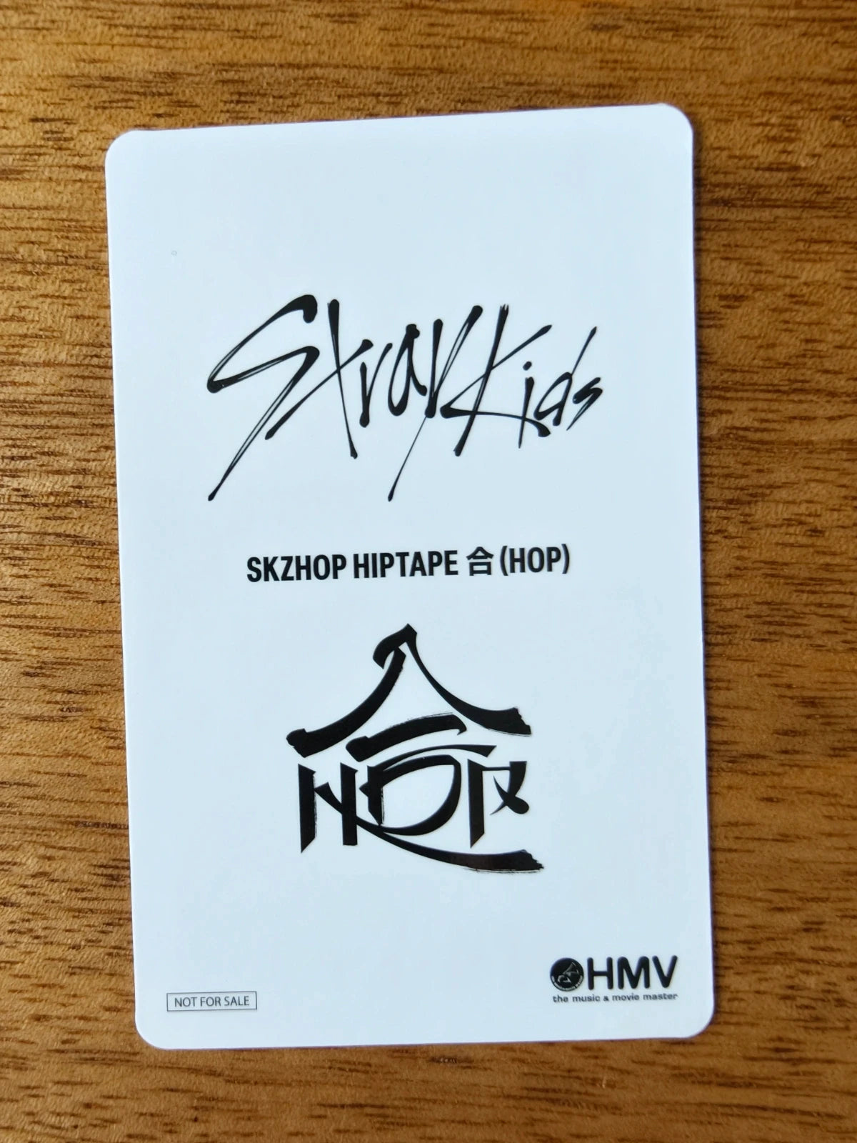 Stray Kids Felix Photocard HOP HMV POB, white reverse with HOP and HMV logos
