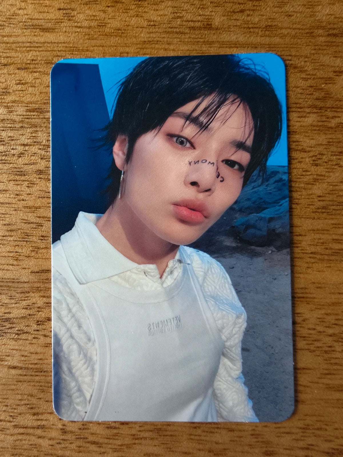 Stray Kids I.N Photocard KARMA, portrait in a white outfit against a blue background