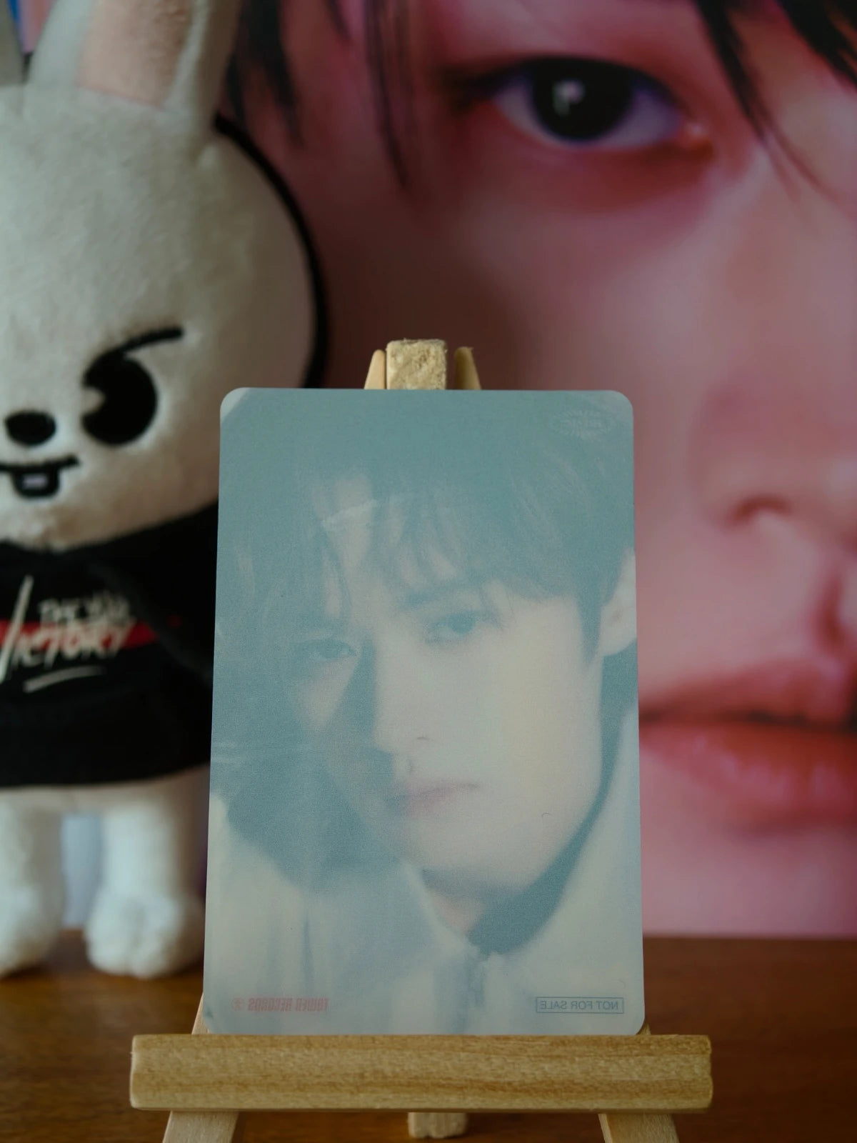 Stray Kids Lee Know Social Path / Super Bowl Photocard (Tower Records Clear POB), reverse of the clear photocard with the portrait visible through it