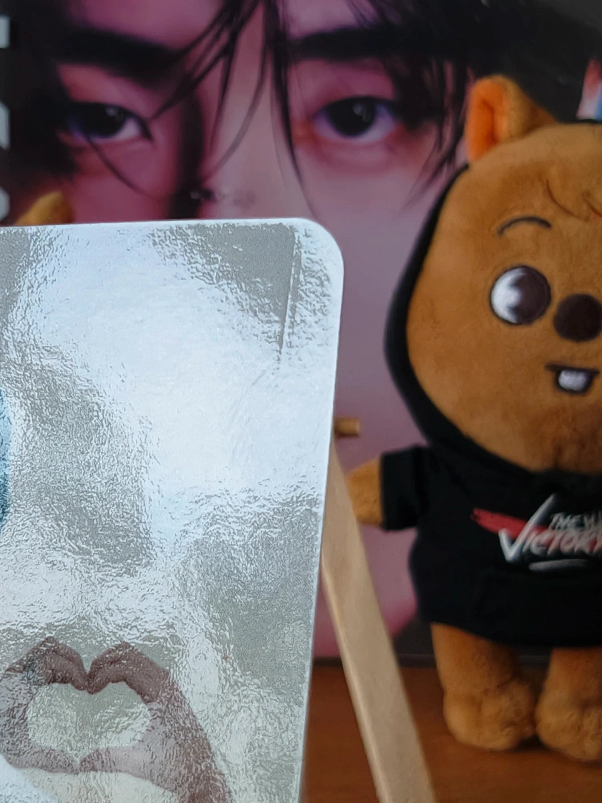 Stray Kids Han ATE Photocard (Boom Double-sided), reflective portrait side viewed at an angle