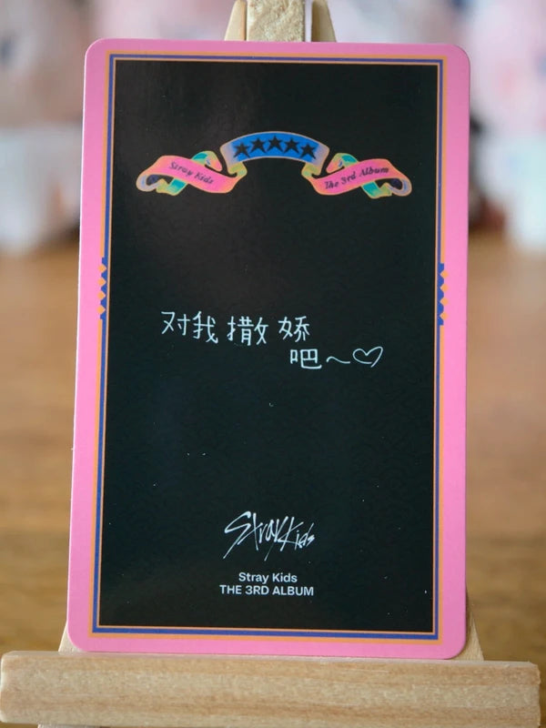 Stray Kids Felix 5-STAR Photocard (KMStation POB, Pink-border Design), reverse of photocard