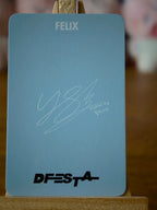 Stray Kids Felix D’FESTA Photocard (Yellow Hair, Purple Shirt Design), reverse of photocard
