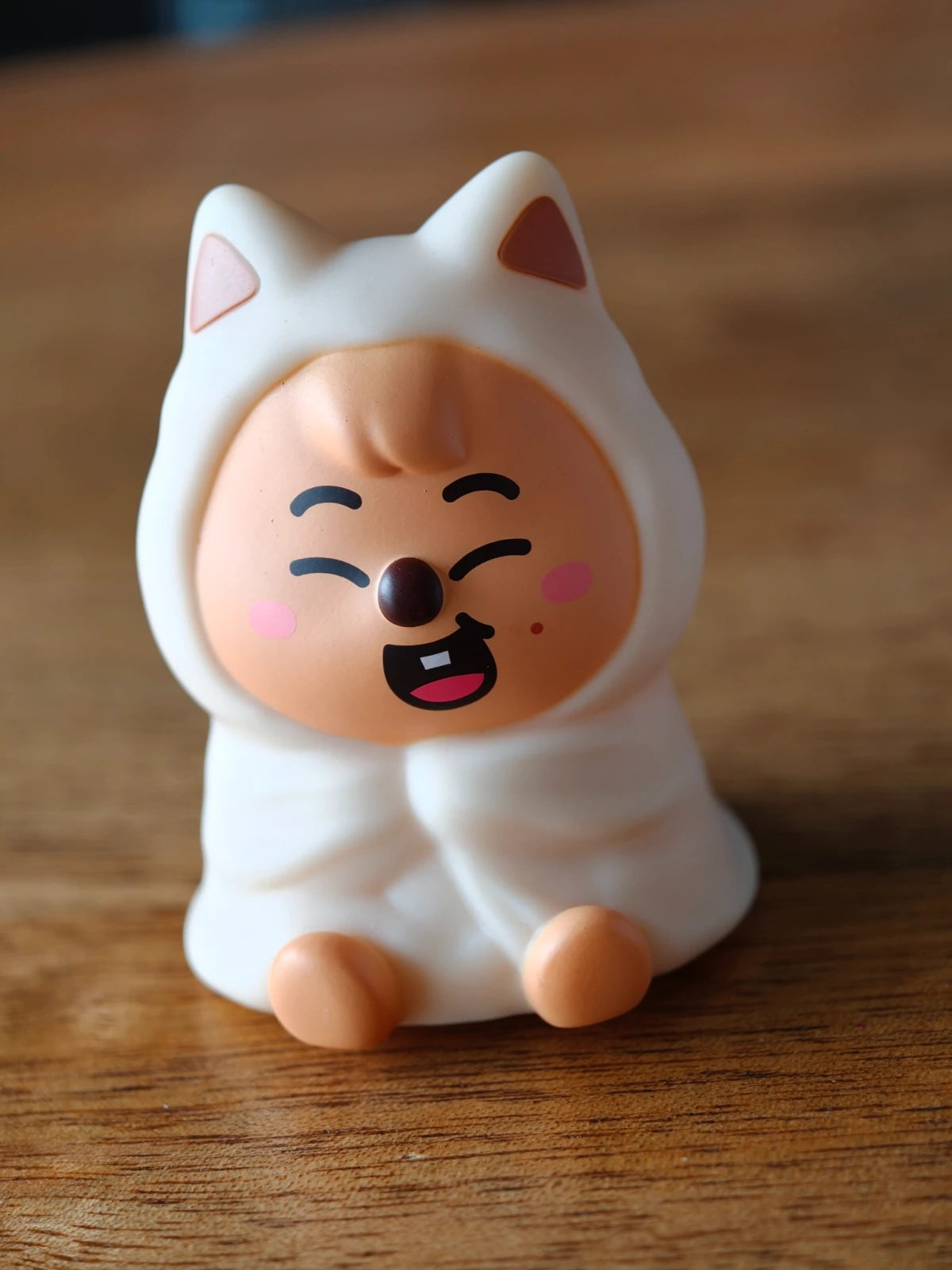 Stray Kids SKZOO HAN QUOKKA Gacha Light, front of the smiling brown figure in a white hood