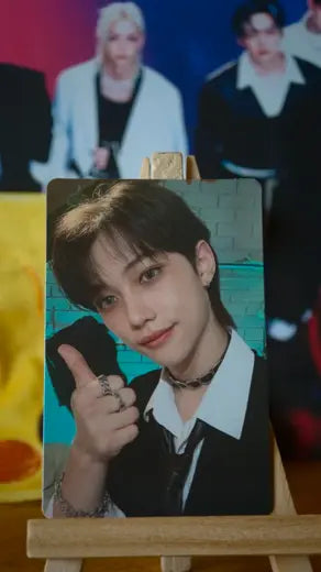 Stray Kids Felix Photocard MAXIDENT POB, portrait with brown hair and thumbs-up pose
